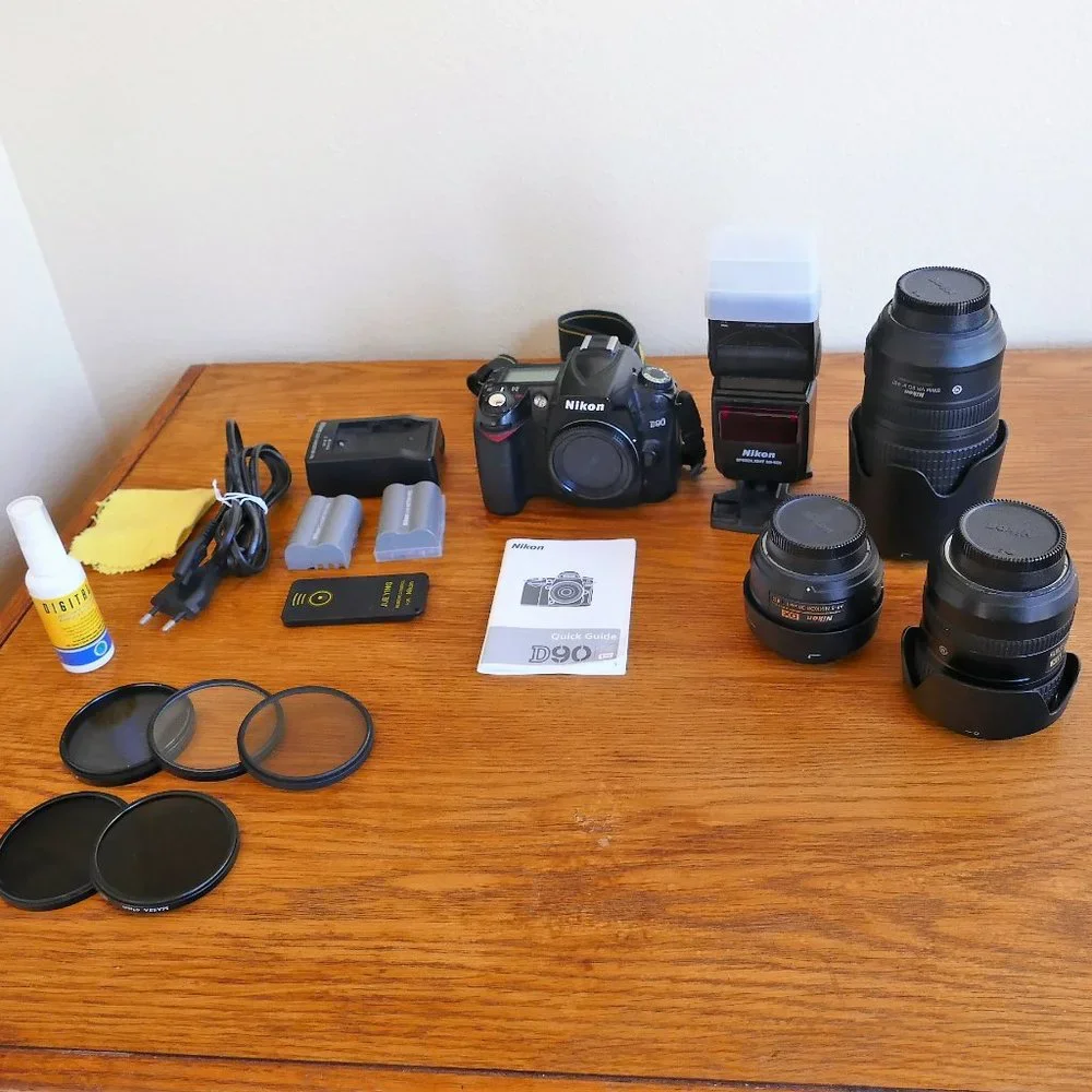 Nikon D90 digital camera, 3 lenses, flash, 5 filters & much more